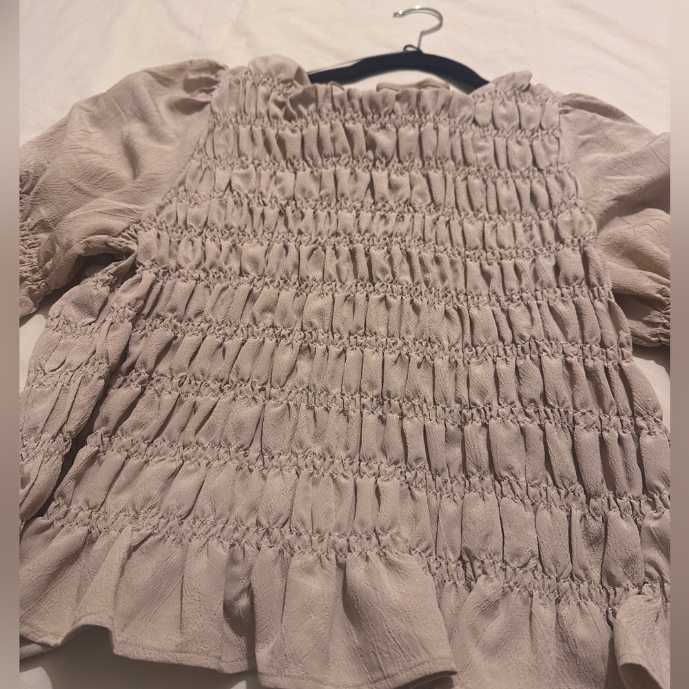 Tan color ruffle blouse